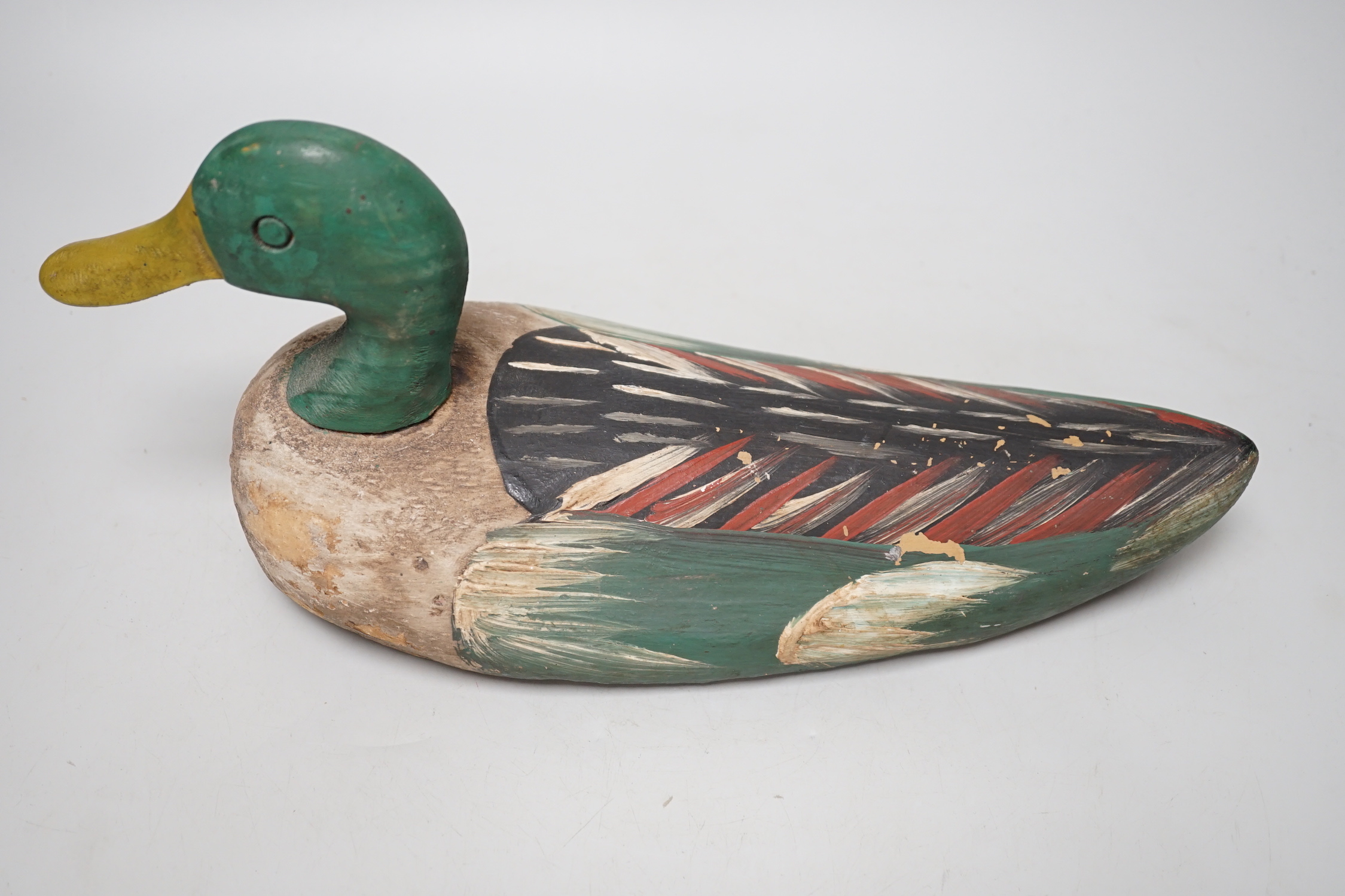Two painted wood decoy ducks, 33cm long